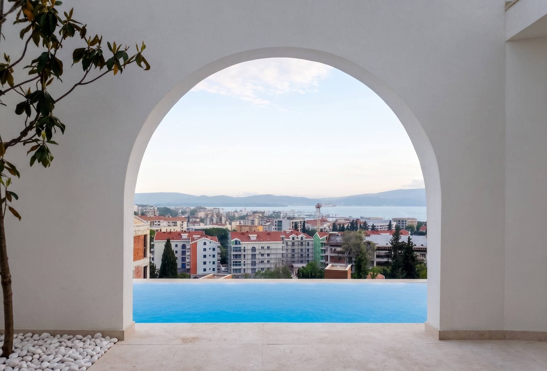Infinity pool arch framing the Bay of Kotor from Oak Tree Villa